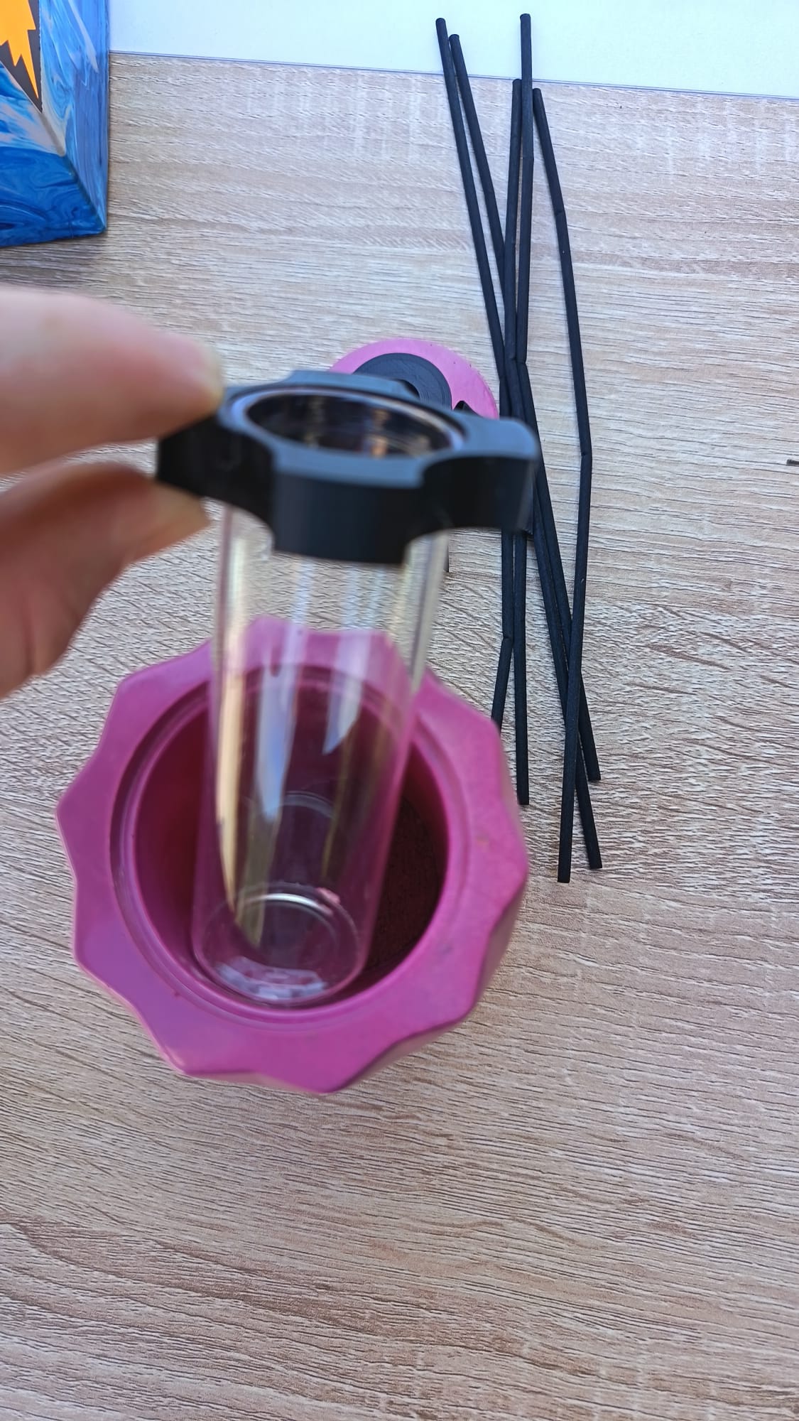 Diffuseur rose avec bâtons