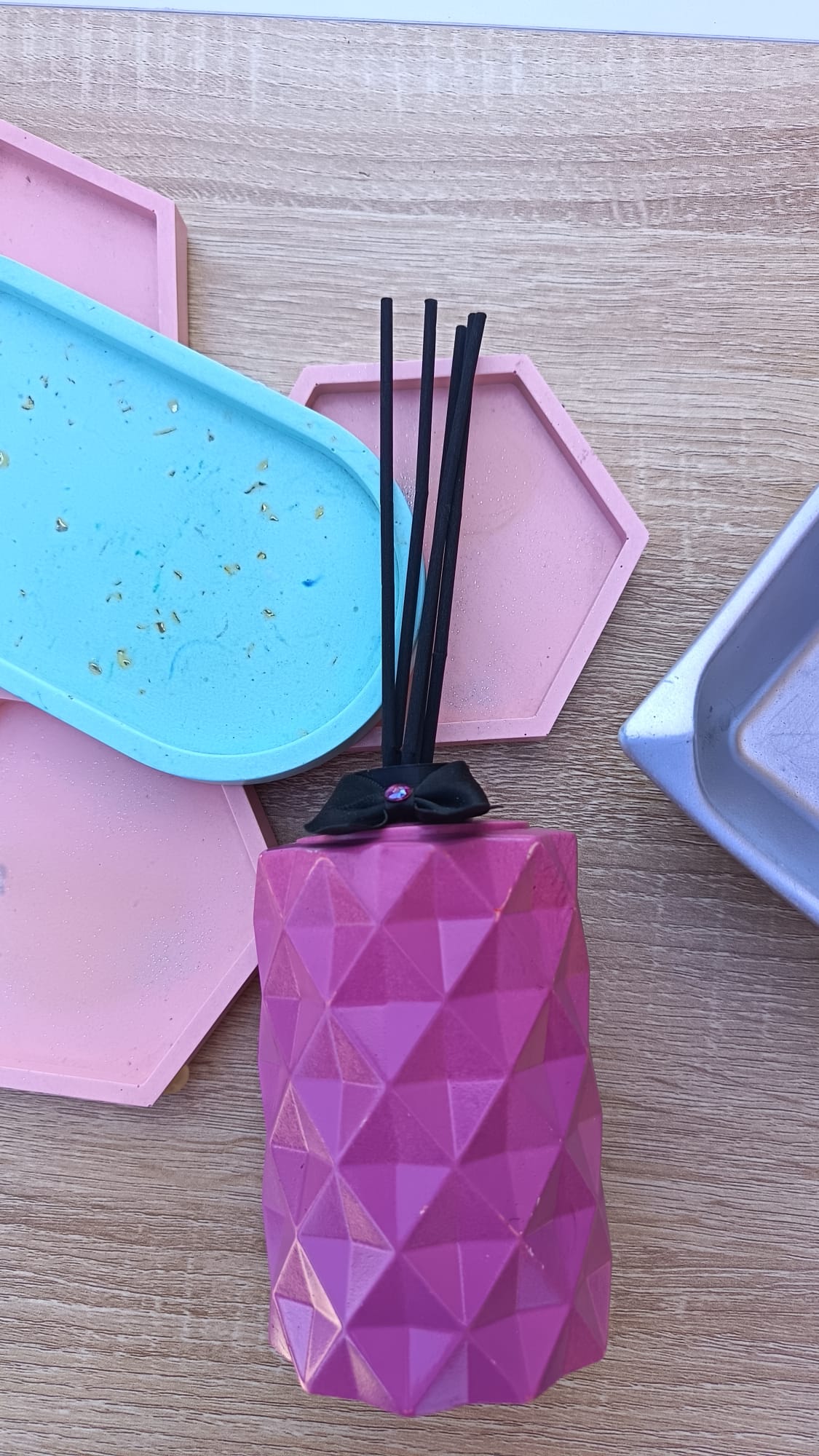 Diffuseur rose avec bâtons